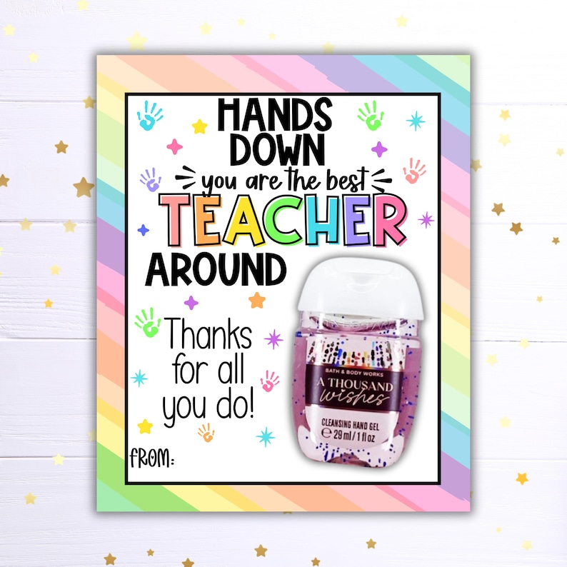 May include: A printable gift tag with a rainbow background and the text "Hands Down You Are The Best Teacher Around". The tag features a small bottle of hand sanitiser with a purple glitter design and the text "A Thousand Wishes".