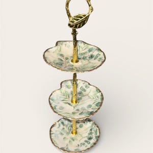 Torre de plato para anillo de joyería con conchas florales