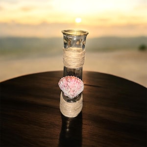 Shell Vase with Gold Trim at the top wrapped with rope for Beautiful Flowers
