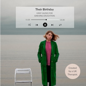 May include: A woman in a green coat and pink top stands near a white chair by the water. The image includes a digital audio player interface with the text "Their Birthday" and "GRIEF AUDIO FOR GRIEVING DAUGHTERS". The text "Created by a UK Therapist" is also present.