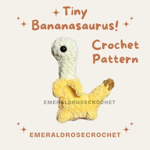 May include: A crocheted Bananasaurus in yellow, cream, and brown. The handmade dinosaur-banana hybrid has a cream-colored head with a black eye and a yellow body. Text reads "Tiny Bananasaurus! Crochet Pattern" and "EMERALDROSECROCHET".