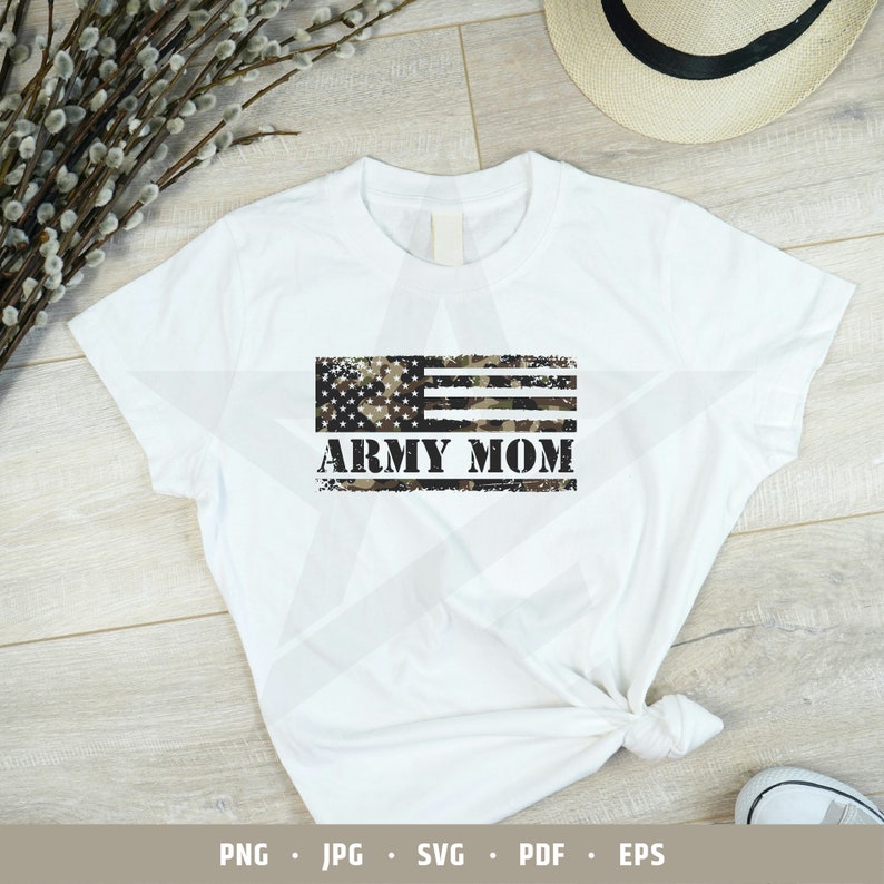 May include: White t-shirt with a distressed American flag design in camouflage colors and the text "ARMY MOM" underneath.