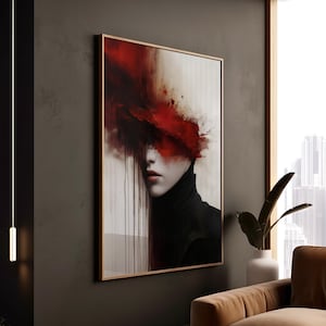 May include: Abstract painting of a woman's face with red paint splattered across her eyes and forehead. The woman is wearing a black turtleneck sweater.