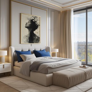 a large bed sitting in a bedroom next to a window