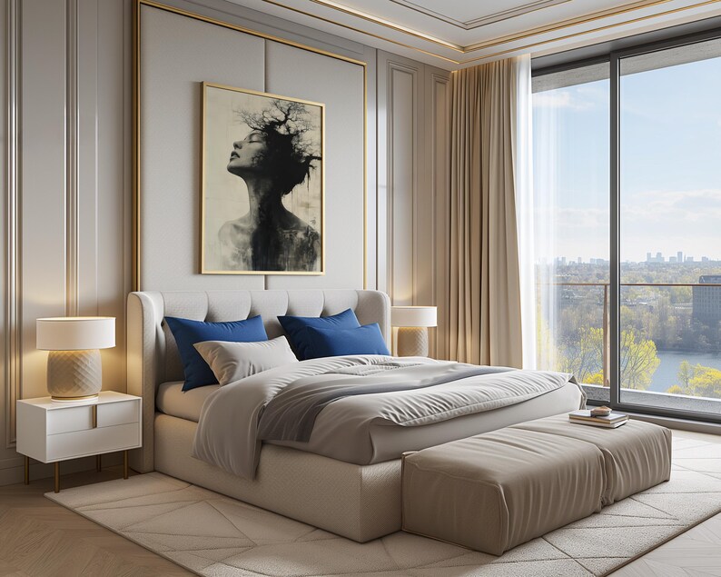 a large bed sitting in a bedroom next to a window