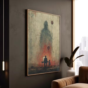May include: Framed artwork featuring a surreal, abstract painting. The artwork depicts a large, shadowy figure holding a balloon, with a smaller figure and child at a desk. The color palette includes red, gray, and brown tones, creating a somber mood.