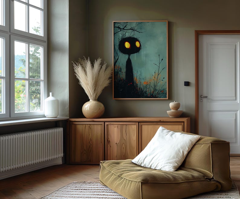 a living room with a couch and a painting on the wall