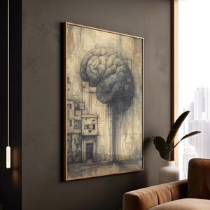 May include: A framed artwork depicting a detailed sketch of a human brain, combined with architectural features. The artwork uses grey and beige tones, set within a wooden frame. The piece is displayed in a contemporary living space.