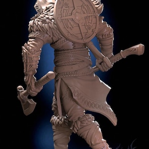 May include: A detailed figurine of a warrior wearing a fur-lined tunic and holding an axe and shield. The shield has a wolf design and the warrior is wearing a belt with intricate designs.