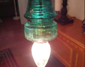 Luce isolante in vetro sospesa