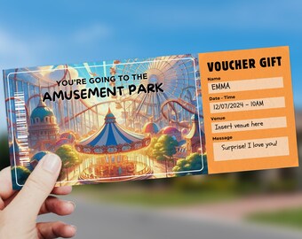 May include: A voucher gift with the text "YOU'RE GOING TO THE AMUSEMENT PARK" and "VOUCHER SURPRISE". The voucher has a colorful amusement park illustration and an orange section with fields for name, date, time, venue, and a message.