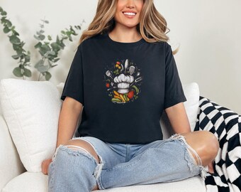 Vibrant Chef's Hat Surrounded by Kitchen Utensils and Vegetables Perfect for Culinary Gifts or Kitchen Wall Decor