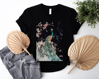 Elegant Peacock with Cherry Blossoms Artistic Graphic T-Shirt for Nature and Animal Lovers with a Luxurious Style