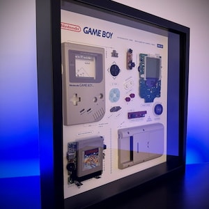 Gerahmte Super Mario Themed Classic Gameboy Demontage Kunst. Teardown Display im Einbaurahmen, Custom Gameboy Print Design.