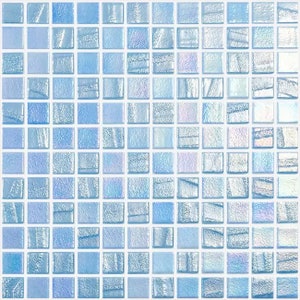 May include: A sheet of iridescent blue mosaic tiles. Each tile is square and has a textured surface. The tiles are arranged in a grid pattern.