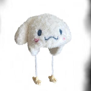 Fuzzy Cinnamoroll Inspired Crochet Puppy Ear Beanie Hat with Ear Flaps and Puffy Star Strings Kawaii Cute Handmade Accessory