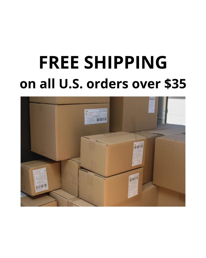 a large stack of cardboard boxes, with a sign that reads "FREE SHIPPING on all U.S. orders over $35".