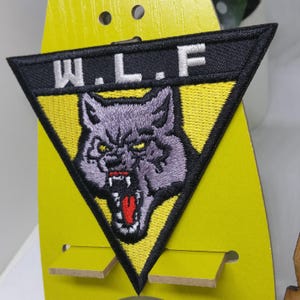 Wolf Wolves Patch Morale Tactical badge Force Army Alien fireflies Freedom Fighter fictional game paramilitary Liberation front WLF