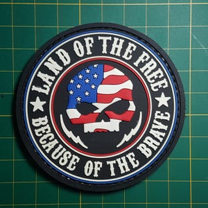 PVC Land of the Free Because Of The Brave Blue Line USA gear vest bag Airsoft bullet hole quote Tactical Green patch morale