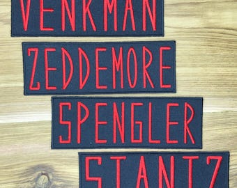 Migliora il tuo cosplay con la toppa Ghostbusters: Venkman, Stantz, Spengler e Zeddemore NY Crew Alien Badge Nametags