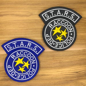 Blau oder schwarz Waschbär Polizei Patch Mole Haken und Schleife bestickt taktisches Kostüm Resident Evil Film rot Cosplay Zombie Biohazard Sterne