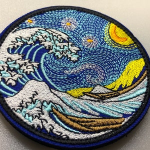 May include: Embroidered patch depicting a blue and white wave against a starry night sky background. The wave is reminiscent of The Great Wave off Kanagawa, and the sky is in the style of Vincent van Gogh's Starry Night.