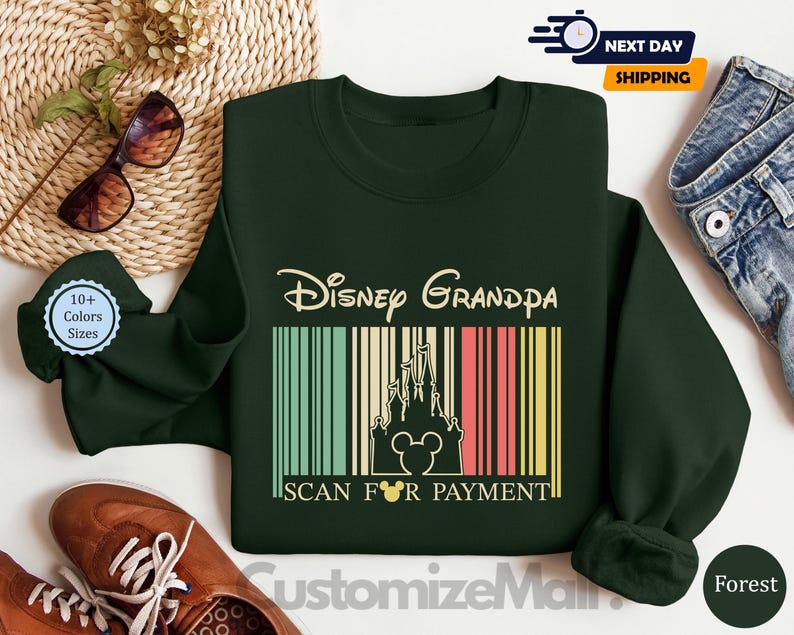a green sweatshirt with a Disney Grandpa design, a pair of brown shoes, sunglasses, and a woven basket.