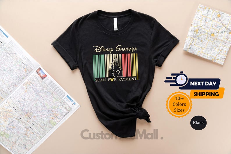 a black t-shirt with a Disney Grandpa theme, along with a map and some shipping labels.