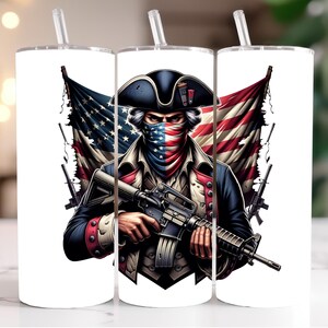 May include: A sublimation design featuring a man wearing a tri-corner hat and a bandana, holding a rifle. He is standing in front of a tattered American flag. The design is perfect for a tumbler or other sublimation projects.