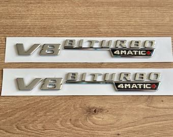 2 Wing Emblems V8 Biturbo 4Matic+ 200mm x 25m Mercedes Logo Grey Chrome