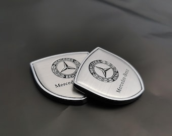 Insignia de guardabarros lateral de metal cromado AMG (39 x 39 mm)