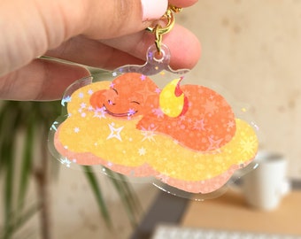 Llavero de Charmander: Durmiendo en las nubes, regalo acrílico para gamers de Nintendo