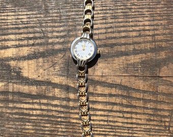 Vintage working gold tone Japan movement quartz cocktail watch 1980s