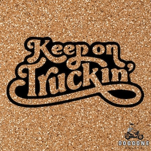 May include: A gold glitter background with black text that reads "Keep on Truckin'" in a retro font style. The text is in a curved shape and has a slight shadow effect. The text is from the company "Doggone Decals".