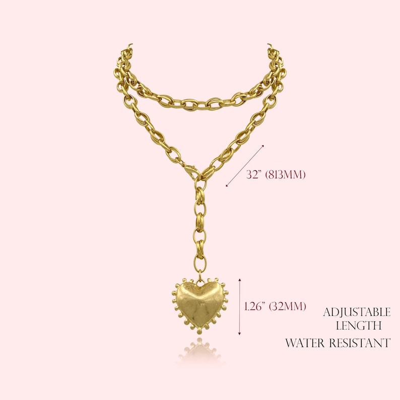 May include: Gold-toned necklace with a heart pendant. The necklace is 32 inches (813mm) long and features an adjustable length. The heart pendant is 1.26 inches (32mm) in length. The necklace is water resistant.