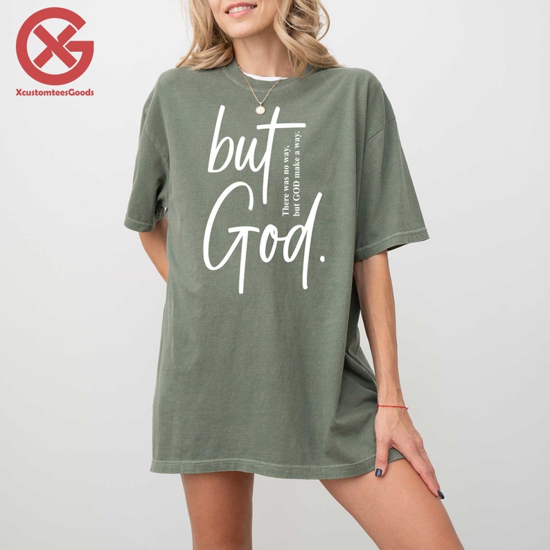 a woman wearing a t - shirt that says, but god