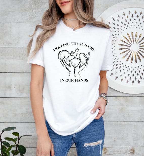 Mother Baby Nurse T-Shirt: Holding The Future In Our Hands
