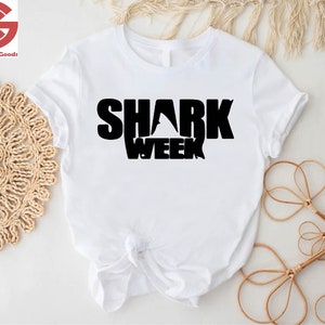 a white shirt with the words shark week on it
