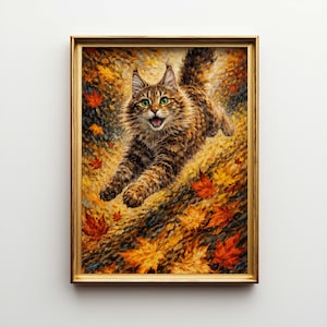 May include: A framed painting of a cat leaping through autumn leaves. The cat has brown and tan fur with green eyes and an open mouth. The leaves are shades of orange, red, and yellow, with a gold frame.