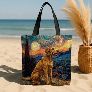 May include: Tote bag featuring a dog illustration set against a vibrant, swirling night sky reminiscent of Van Gogh's "Starry Night." The dog is a golden-brown color, and the bag has black handles. The background includes a cityscape and a beach setting.