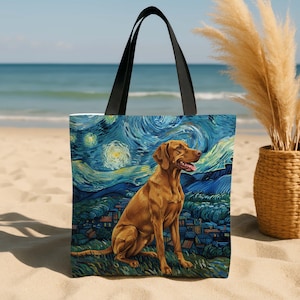May include: Tote bag featuring a Vizsla dog illustration set against a starry night sky, reminiscent of Van Gogh's style. The bag has black handles and a vibrant, colorful design, perfect for carrying essentials.