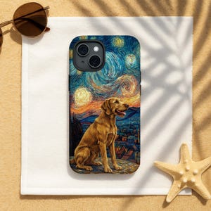 May include: A phone case featuring a golden retriever dog sitting in front of a painting of a starry night. The case has a black camera cutout and a colorful, artistic design. The dog is the focal point of the image.