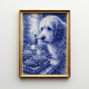 May include: Blue and white framed print featuring a dog, a bottle with a pump, and succulents. The artwork has a pen and ink style, with a gold frame. The dog is looking at the bottle. The succulents are in a wooden planter.