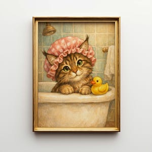 May include: A framed print of a tabby cat in a bathtub, wearing a pink polka-dot shower cap. A yellow rubber duck sits beside the cat. The background features a shower head, tiled wall, and a towel.