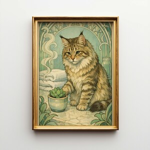 May include: A framed art print featuring a detailed illustration of a fluffy cat with brown and tan fur. The cat sits near a small potted succulent. The background has a soft, muted color palette of greens and blues, with decorative elements.