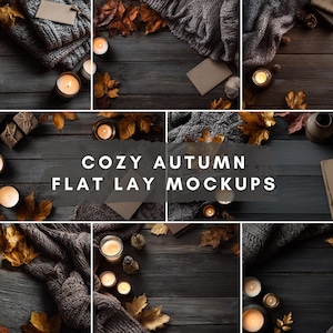 May include: A selection of flat lay mockups with an autumnal theme. The image shows a dark wooden surface with lit candles, autumn leaves, and a knitted blanket. The text "COZY AUTUMN FLAT LAY MOCKUPS" is displayed in the centre.