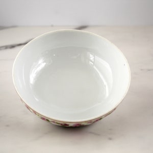 Interior of lid for pink flowered butter dish
