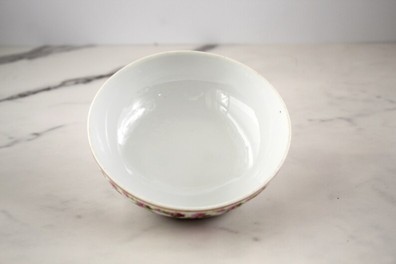 Interior of lid for pink flowered butter dish
