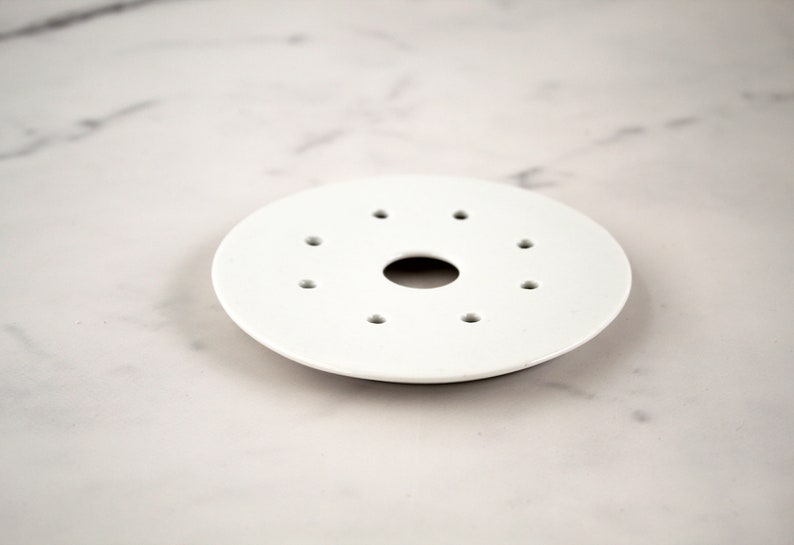 Pierced insert for pink flowered butter dish