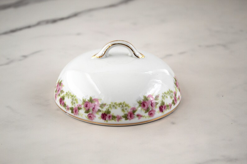 Lid for pink flowered butter dish